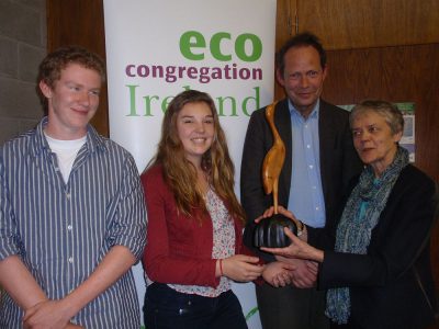 Sr Catherine Brennan presents St Kilian's with a special award in recognition of their environmental endeavours