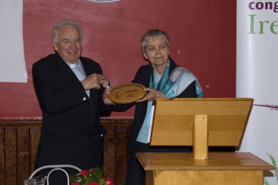 Sr Catherine Brennan, chairperson of Eco-Congregation Ireland, presents Bishop Bill Murphy with an Eco-Congregation plaque