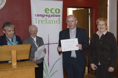 Sr Catherine Brennan and Sr Regina O'Connell pictured with Fr Michael Moynihan and a parishioner from Castleisland parish