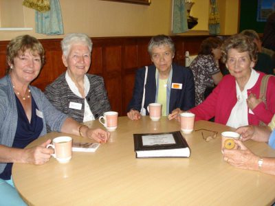 Catherine Brennan SSL, ECI chairperson, (2nd from right) chats to delegates 